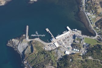 Oblique aerial view of Lochinver and Culag pier, looking N.