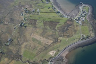 Oblique aerial view of Aird Point anti aircraft battery and Tighnafiline, looking SE.