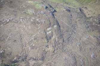 Oblique aerial view of Mellangaun gun emplacement, looking SSW.