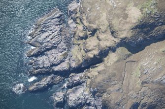 Oblique aerial view of the location of Mellangaun submarine defence boom, looking S.