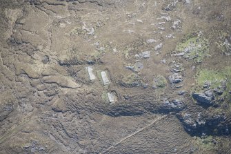 Oblique aerial view of Mellangaun gun emplacement, looking E.