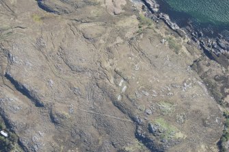 Oblique aerial view of Mellangaun gun emplacement, looking ENE.