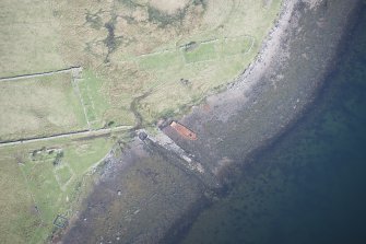 Oblique aerial view of a jetty at Gualann Mhor on the Isle of Ewe, looking NW.