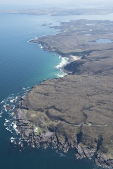 General oblique aerial view with Rubha Reidh Lighthouse in the foreground and Slaggan Bay beyond, looking E.