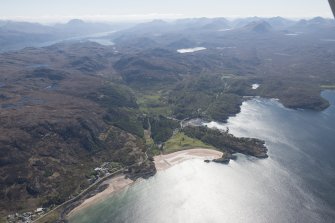 General oblique aerial view centred on Gairloch golf course with Loch Maree beyond, looking SE.