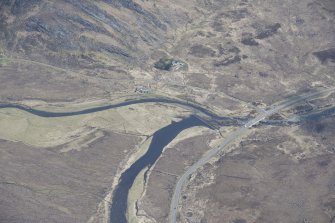 Oblique aerial view of the field system and weir at Lub na Bruaich, looking NNE.