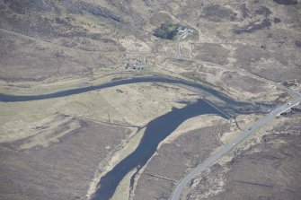 Oblique aerial view of the field system and weir at Lub na Bruaich, looking NNE.