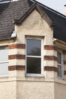 Detail of window on north east corner of main block.