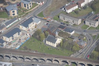 Oblique aerial view of Kilmarnock Old High Kirk and Kirkyard, looking NNE.