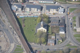Oblique aerial view of Kilmarnock Old High Kirk and Kirkyard, looking WNW.