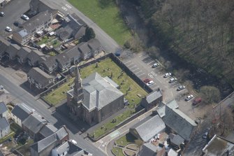 Oblique aerial view of Loudoun Old Parish Church and Newmilns Churchyard, looking ESE.