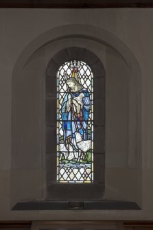 South aisle. Stained glass window.