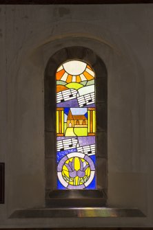 South aisle. Stained glass window.