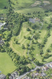 Oblique aerial view of Pitfirrane Golf Course, Pitfirrane Castle and gate piers, looking SSW.