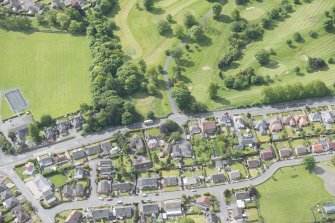 Oblique aerial view of Pitfirrane Castle gate piers, looking SSW.