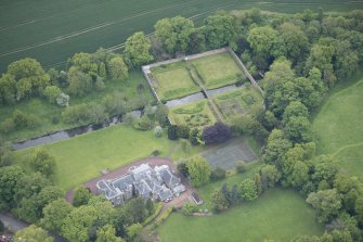 Oblique aerial view of Gogar Bank House and walled garden, looking SSE.