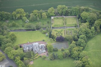 Oblique aerial view of Gogar Bank House and walled garden, looking SE.