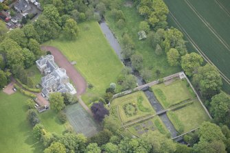 Oblique aerial view of Gogar Bank House and walled garden, looking E.