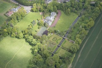 Oblique aerial view of Gogar Bank House and walled garden, looking NE.