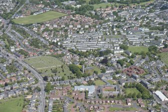 General oblique aerial view of Liberton centred on Liberton Parish Church and Liberton Cemetery, looking N.