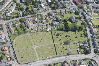 Oblique aerial view of Liberton Parish Church and Liberton Cemetery, looking ENE.