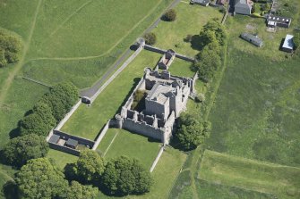 Oblique aerial view of Craigmillar Castle, looking ENE.