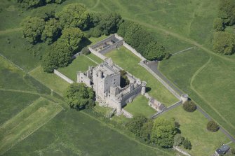 Oblique aerial view of Craigmillar Castle, looking WNW.