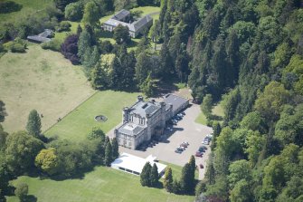 Oblique aerial view of Melville Castle, looking SW.