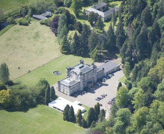 Oblique aerial view of Melville Castle, looking SSW.