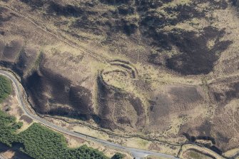 Oblique aerial view of the settlement and track, looking ENE.