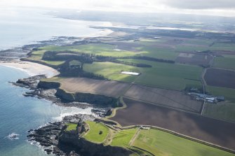 General oblique aerial view along the East Lothian coastline with Tantallon Castle in the foreground, looking SE.