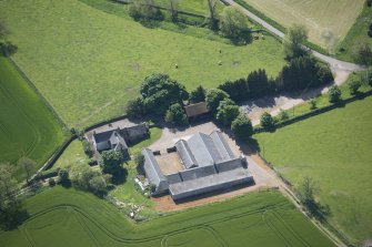 Oblique aerial view of Mains of Rochelhill Farm, looking SE.