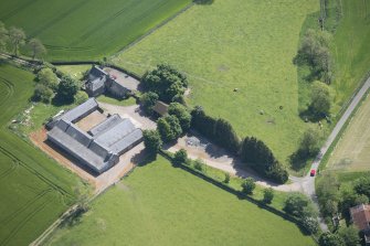 OOblique aerial view of Mains of Rochelhill Farm, looking E.