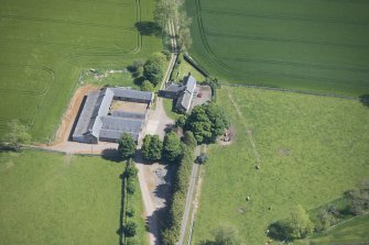Oblique aerial view of Mains of Rochelhill Farm, looking NE.