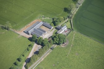 Oblique aerial view of Mains of Rochelhill Farm, looking N.