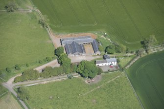 Oblique aerial view of Mains of Rochelhill Farm, looking NW.