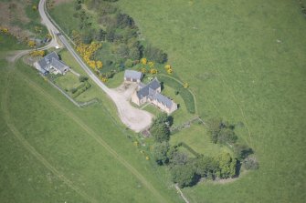 Oblique aerial view of Easter Clune House and Castle of Easter Clune, looking WNW.