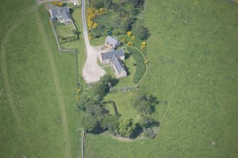 Oblique aerial view of Easter Clune House and Castle of Easter Clune, looking W.