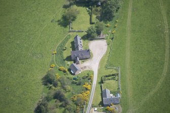 Oblique aerial view of Easter Clune House and Castle of Easter Clune, looking E.