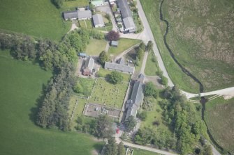 Oblique aerial view of Chapeltown School and Roman Catholic Church of Our Lady of Perpetual Succour, chapel house and burial ground, looking NE.