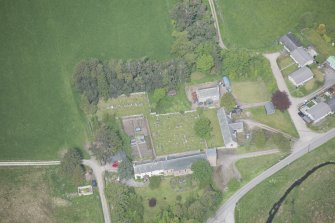 Oblique aerial view of Chapeltown School and Roman Catholic Church of Our Lady of Perpetual Succour, chapel house and burial ground, looking NW.