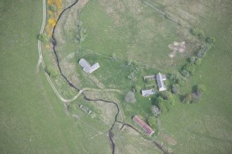 Oblique aerial view of Scalan Cottage and Roman Catholic Seminary, looking N.