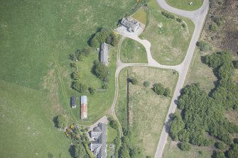 Oblique aerial view of Ballantruan Farmhouse, looking NE.