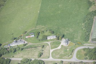 Oblique aerial view of Ballantruan Farmhouse, looking NW.