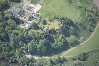 Oblique aerial view of Drumin Castle and Drumin Farmstead, looking SW.