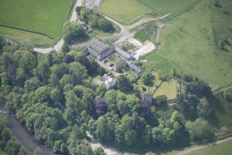 Oblique aerial view of Drumin Castle and Drumin Farmstead, looking SSW.