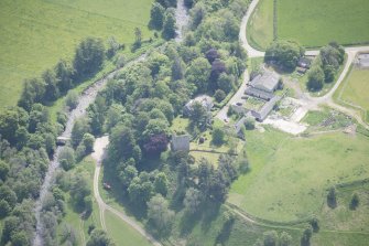 Oblique aerial view of Drumin Castle and Drumin Farmstead, looking SE.