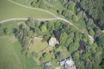 Oblique aerial view of Drumin Castle, looking NE.