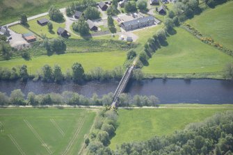 Oblique aerial view of Ballindalloch railway bridge, looking S.