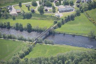 Oblique aerial view of Ballindalloch railway bridge, looking SSE.